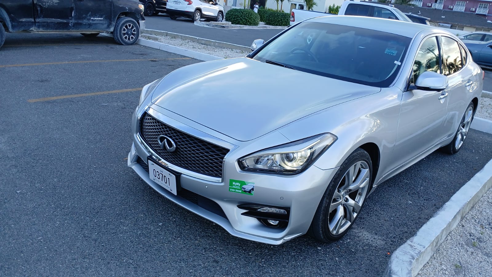 Silver nissan fuga in turks and caicos island